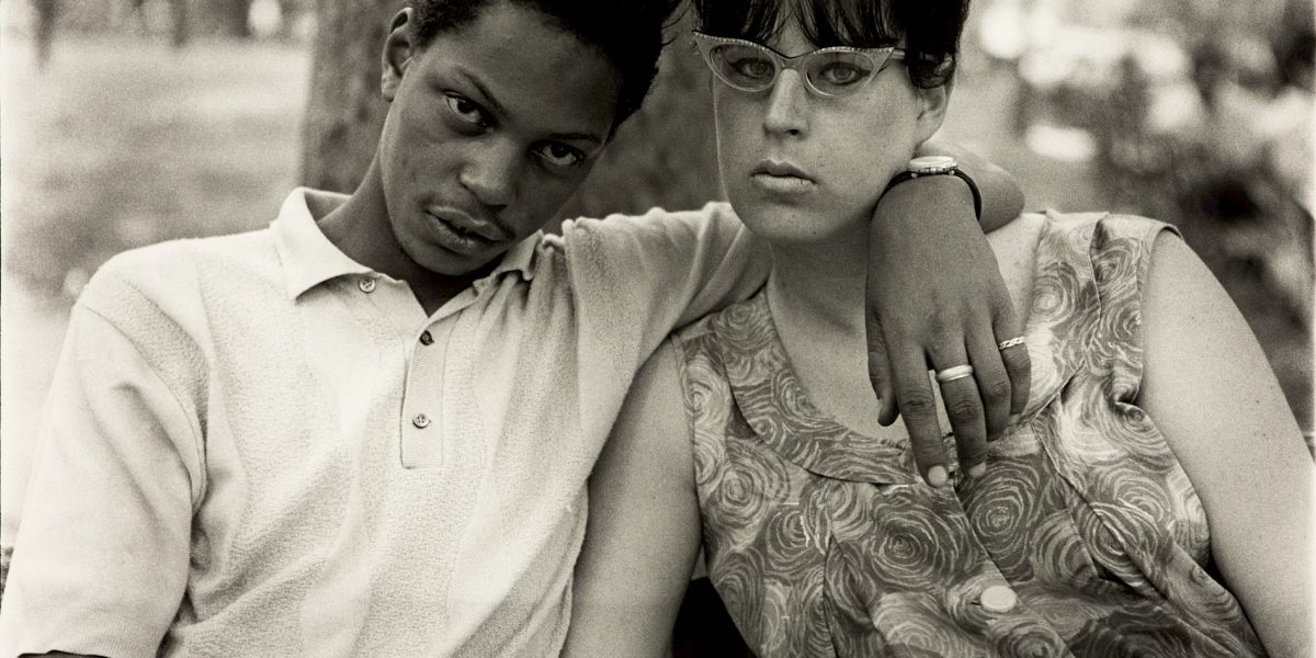Diane Arbus — Young Man and his Pregnant Wife in Washington Squa Photographed through anti-UV perspex- colour charts only a guide.